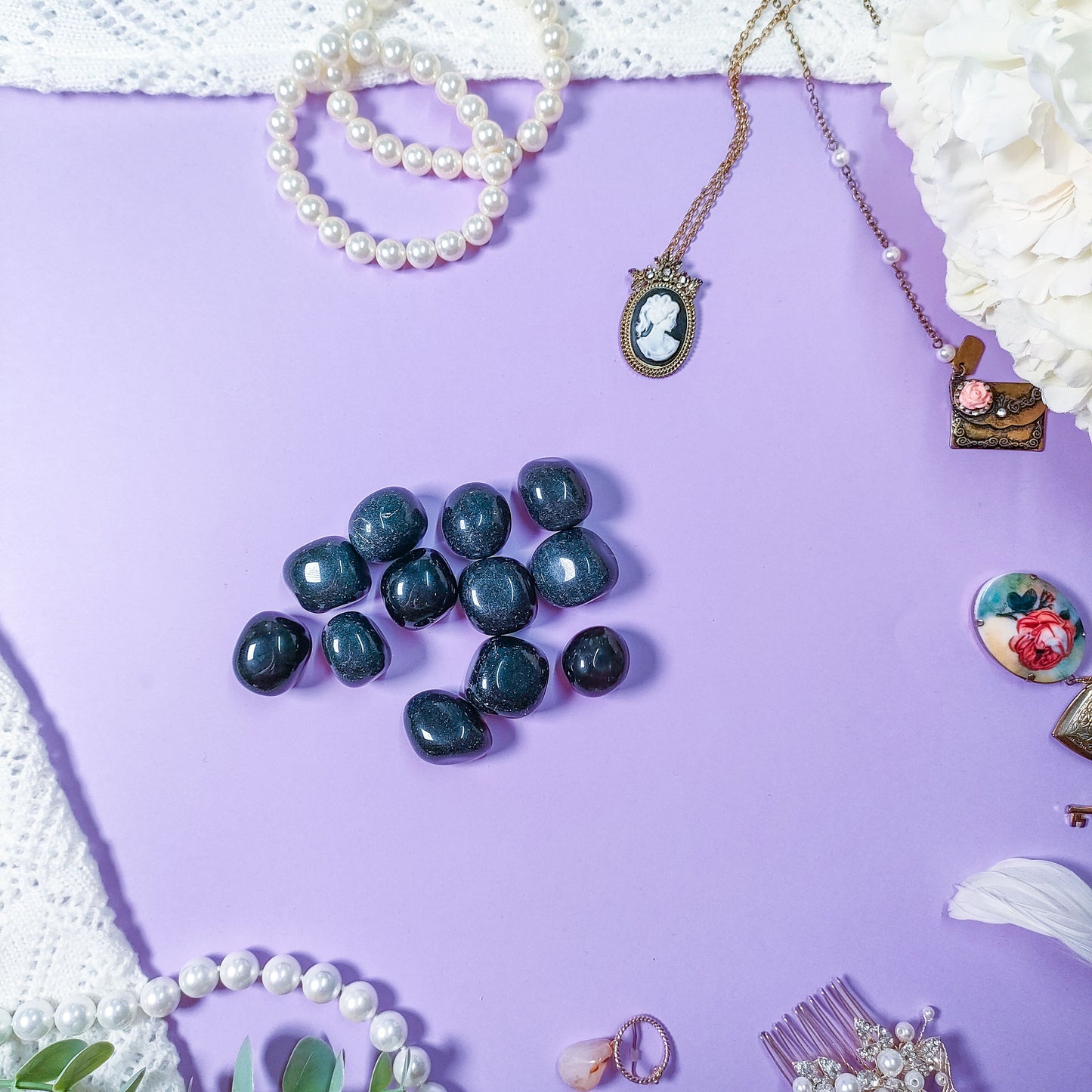 Musta obsidiaani rumpuhiottu